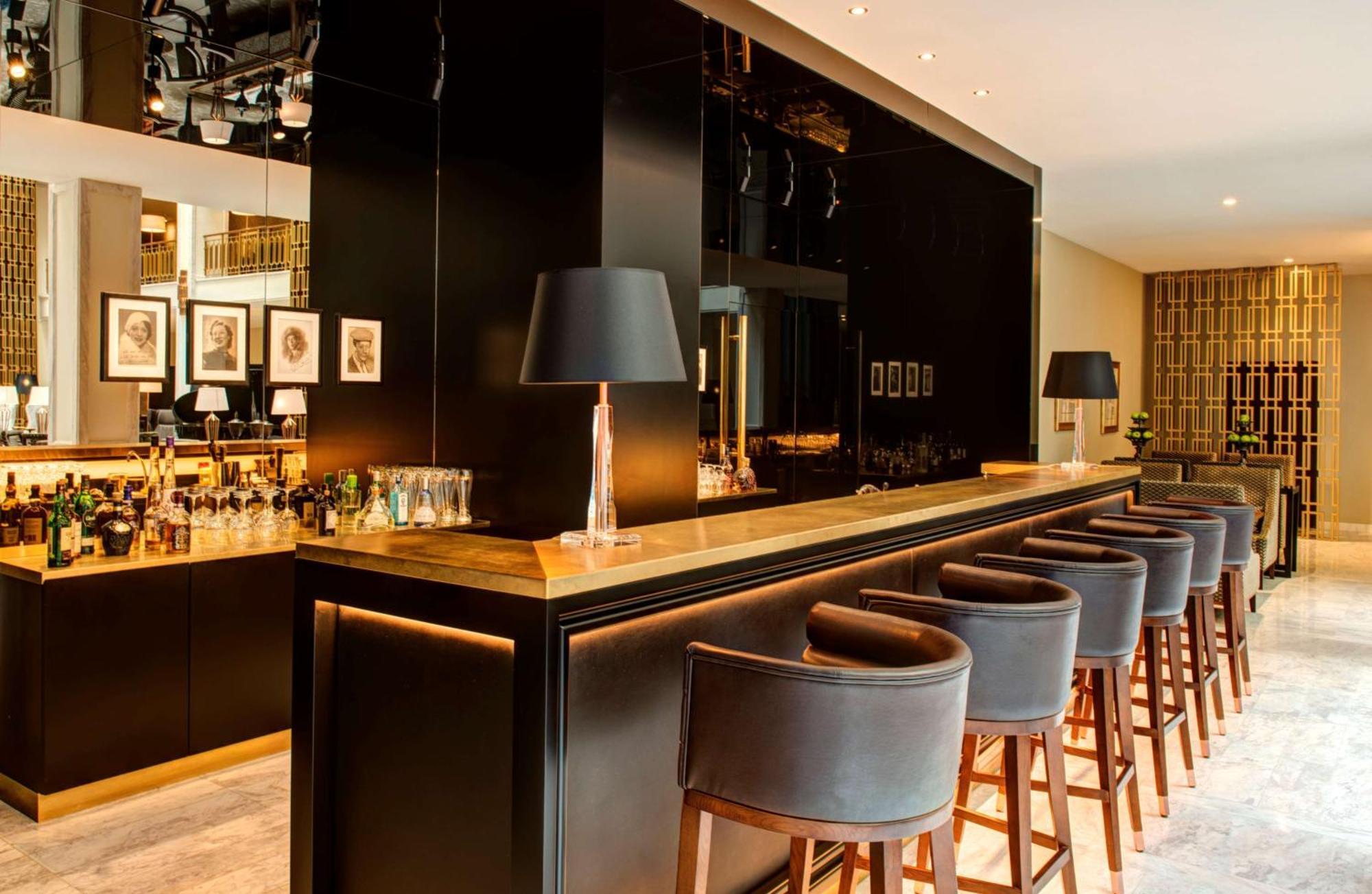 티볼리 아베니다 리베르다데 더 리딩 호텔 오브 더 월드 리스본 외부 사진 The bar at the 1906 Lounge